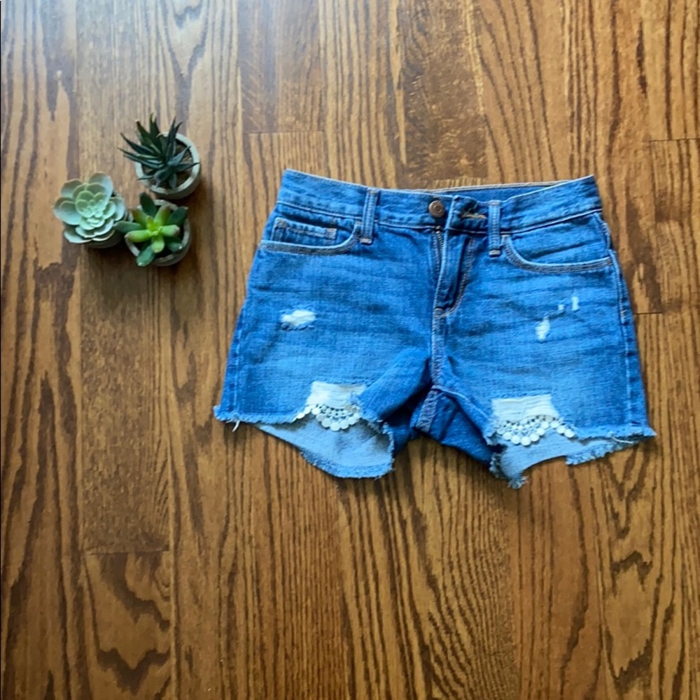old navy blue jean shorts with floral rips